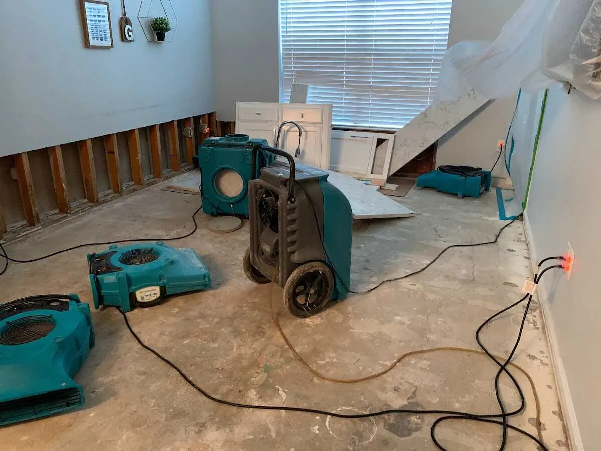 Dehumidifier in flood-cut room for Water Damage Restoration in Castle Pines